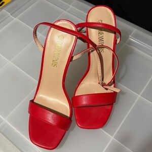 Strappy red heels